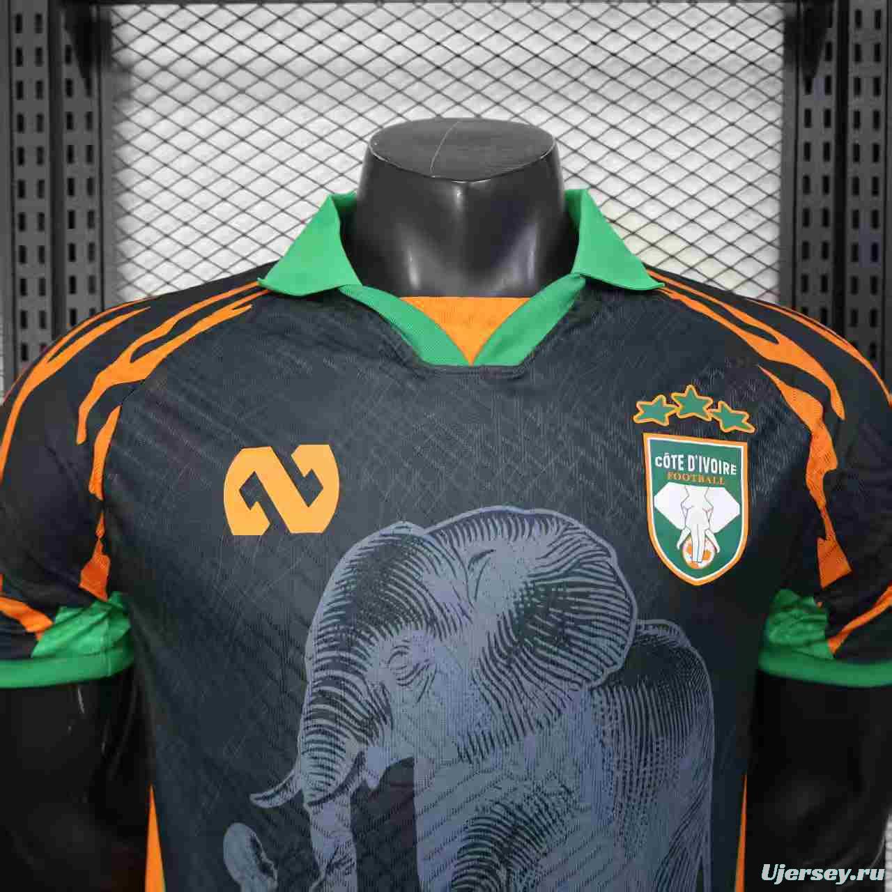 Player Version 2025 Ivory Coast Black with Elephant Graphic and Orange Stripes Jersey